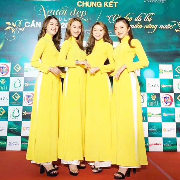 Áo dài Vàng quần trắng